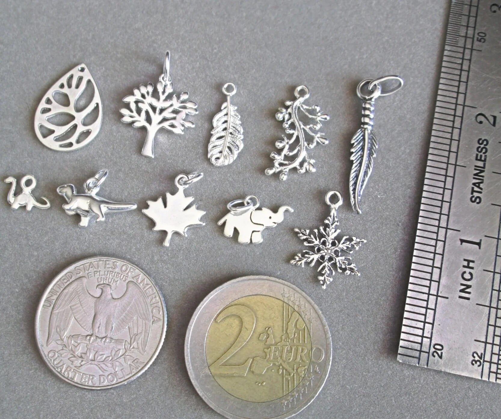 Antique silver online charms